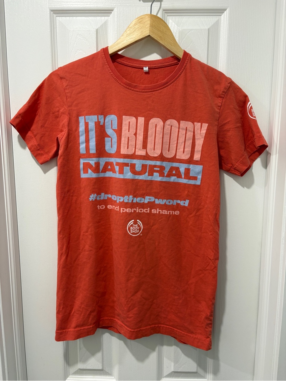 Women’s the body shop t shirt size XS orange graphic